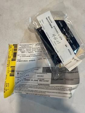 0705042-1-279 Cessna New Escutcheon With 8130 P/n