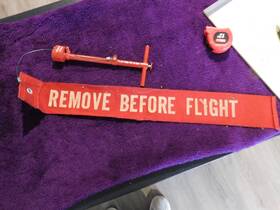 98gt1030 Gulfstream Remove Before Flight Safety Lock Pin And Flag. Aircraft
