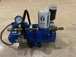Gast Rotary Vane Supplied Air Pump 1023-P305-G302X, Hose And Hood. Fixed Price $599.00.