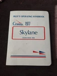 Cessna 1977 Skylane 182Q Pilot's Operating Handbook With Plastic Hard Cover. Fixed Price $100.00.