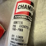 Champion , Apu Ignitor Plug P/n CH34713 Nos (0224-205). Fixed Price $390.00.