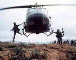 Bell UH-1 Huey Helicopter Dropping Off Troops 8"X 10" Vietnam War Photo 957. Fixed Price $7.43.