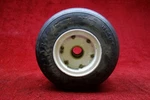 Goodyear, Cleveland, Parker 40-181B Tire 19.5X6.75-8 W/ Rim 6.50-8 Pn 196K08-9. Fixed Price $1095.95.