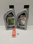 New Oem Kawasaki 2-STROKE Oil + Plug Kit KX80/KX85/KX100/KX112. Fixed Price $49.99.