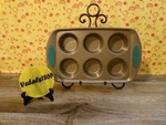 Rachael Ray Non-stick Bakeware Muffin Pan Golden Brown W/teal Silicone Grips. Fixed Price $10.99.
