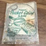 Vintage Pioneer Pocket Chain Saw Steel Wire Blade Lightweight Handles. Fixed Price $22.99.